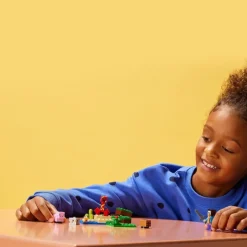 LEGO Puzzles Y Construcciones*Set Para Construir La Emboscada Del Creeper Con Mini Figuras De Steve, Cerdito Y Pollo Minecraft